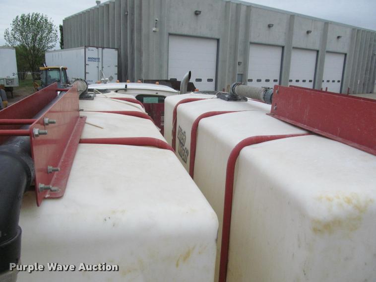 image for item DA1059 2006 Sterling A9500 flatbed truck with Ditch Witch mud mixing system