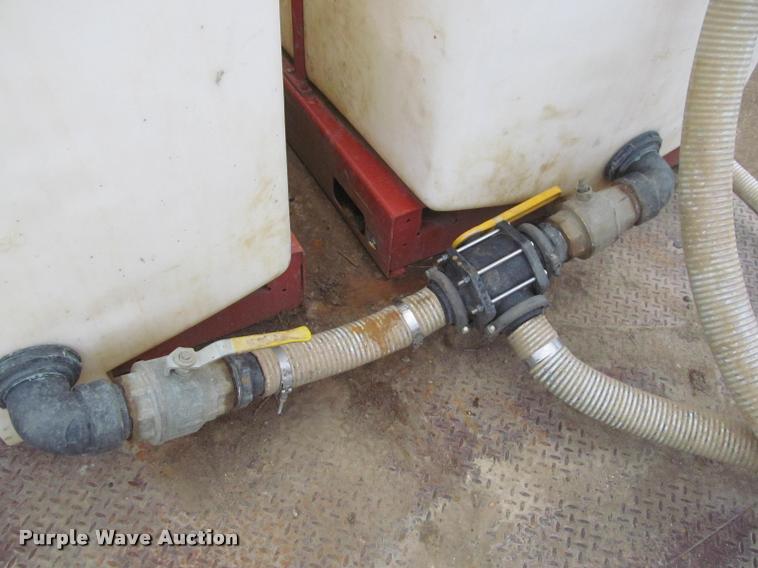 image for item DA1059 2006 Sterling A9500 flatbed truck with Ditch Witch mud mixing system