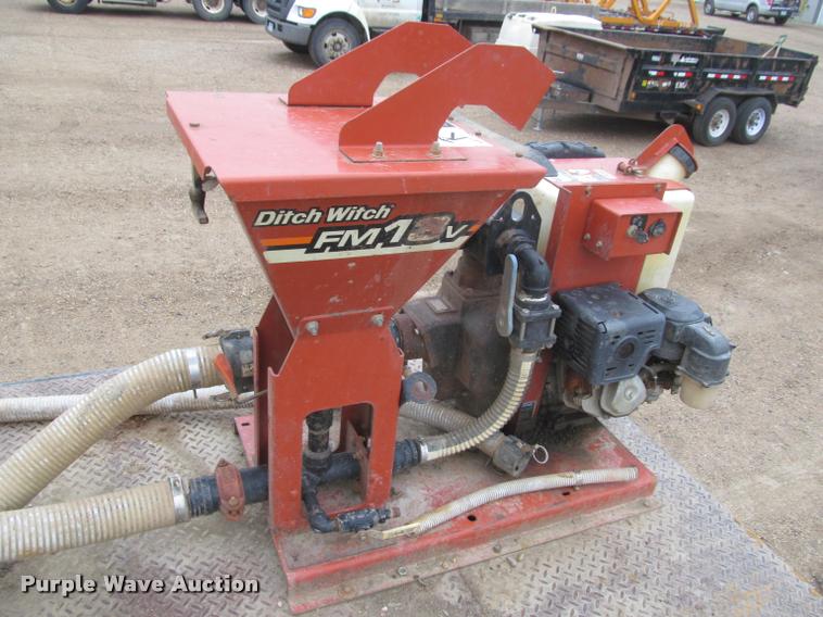 image for item DA1059 2006 Sterling A9500 flatbed truck with Ditch Witch mud mixing system