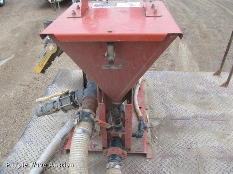 image for item DA1059 2006 Sterling A9500 flatbed truck with Ditch Witch mud mixing system