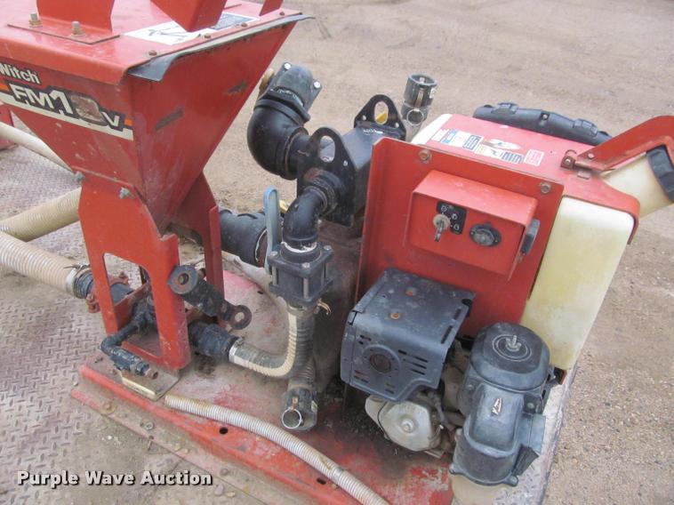 image for item DA1059 2006 Sterling A9500 flatbed truck with Ditch Witch mud mixing system