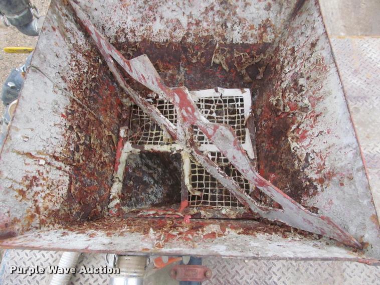 image for item DA1059 2006 Sterling A9500 flatbed truck with Ditch Witch mud mixing system