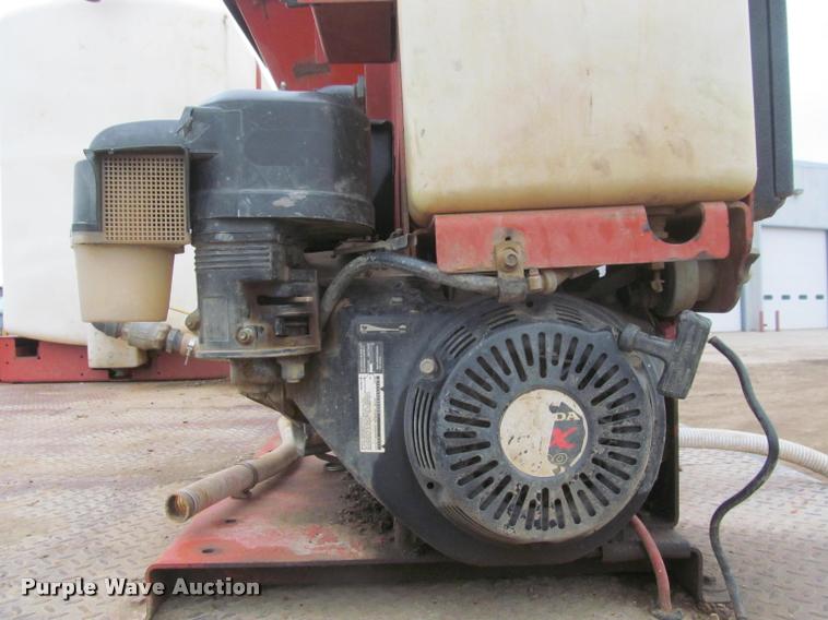 image for item DA1059 2006 Sterling A9500 flatbed truck with Ditch Witch mud mixing system