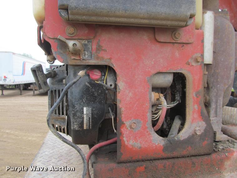 image for item DA1059 2006 Sterling A9500 flatbed truck with Ditch Witch mud mixing system