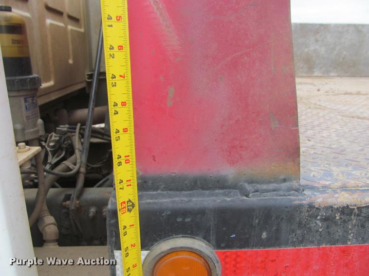 image for item DA1059 2006 Sterling A9500 flatbed truck with Ditch Witch mud mixing system