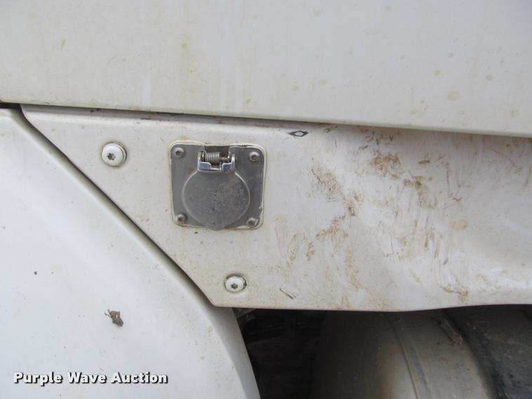 image for item DA1059 2006 Sterling A9500 flatbed truck with Ditch Witch mud mixing system