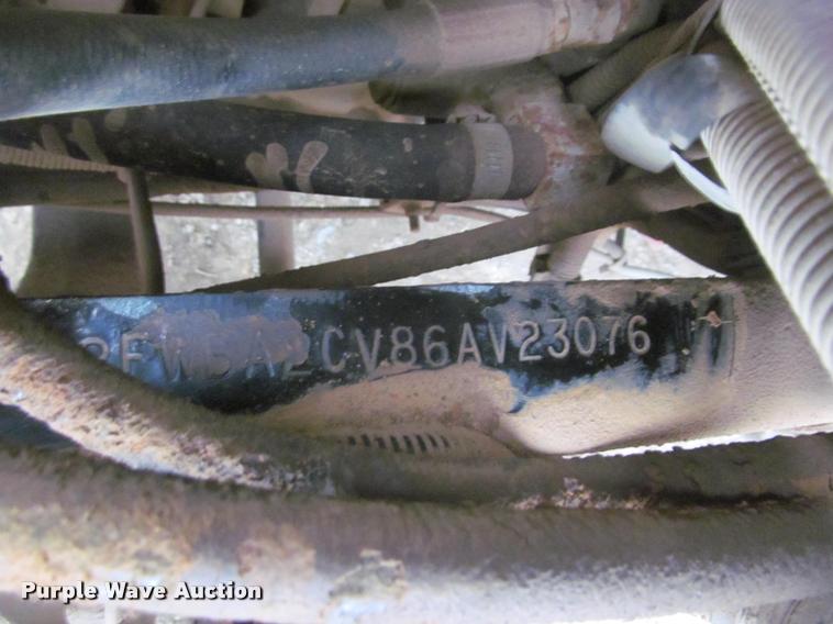 image for item DA1059 2006 Sterling A9500 flatbed truck with Ditch Witch mud mixing system