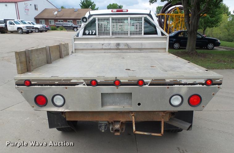 image for item L5574 2006 Chevrolet Silverado 2500HD flatbed pickup truck