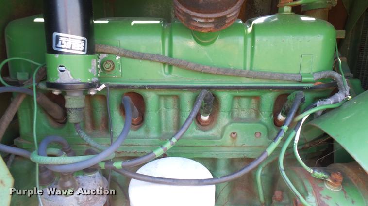 image for item DA7951 John Deere 215A self-propelled windrower