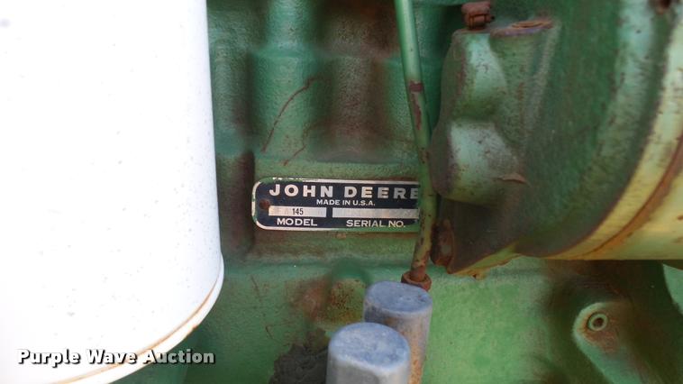 image for item DA7951 John Deere 215A self-propelled windrower