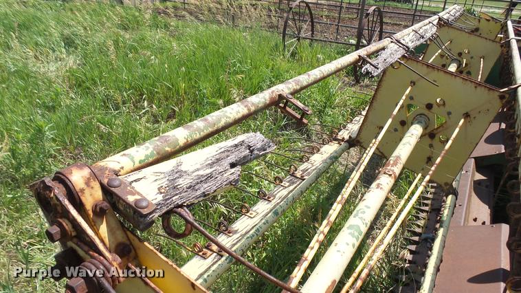 image for item DA7951 John Deere 215A self-propelled windrower