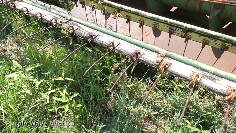 image for item DA7951 John Deere 215A self-propelled windrower