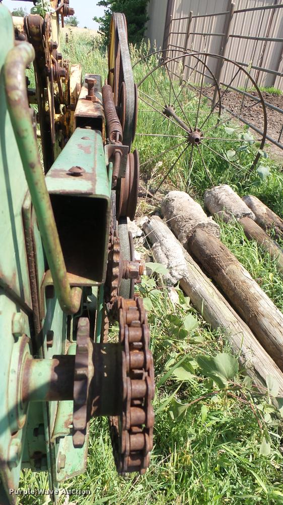 image for item DA7951 John Deere 215A self-propelled windrower