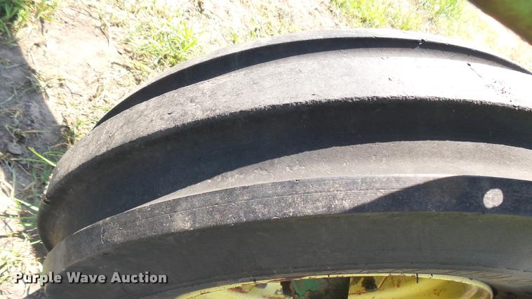 image for item DA7951 John Deere 215A self-propelled windrower