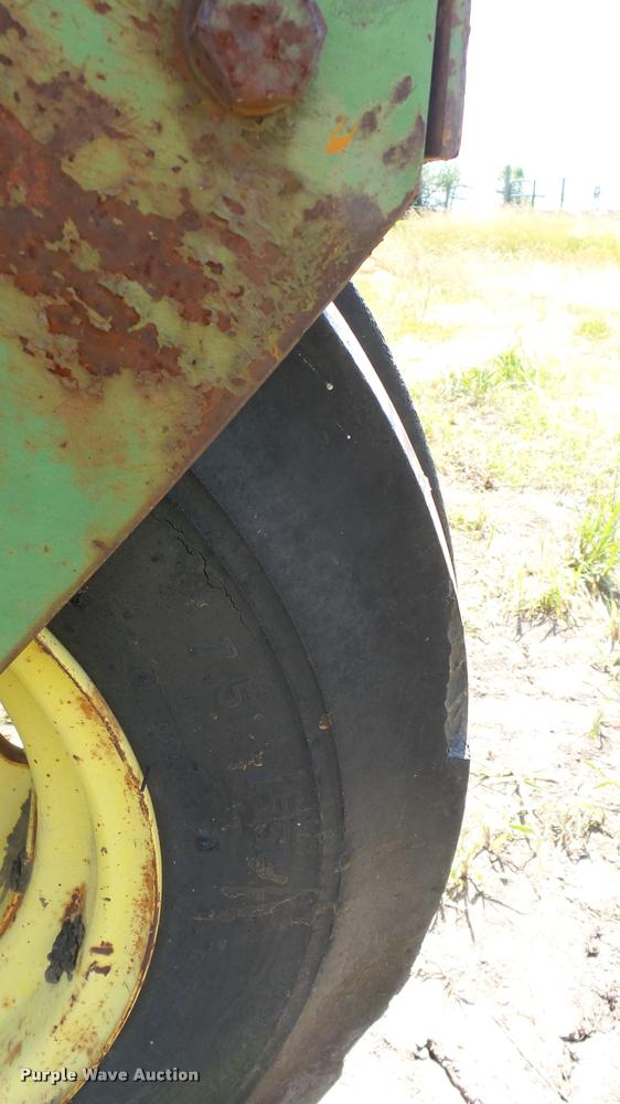 image for item DA7951 John Deere 215A self-propelled windrower