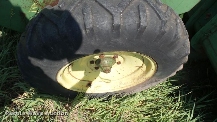 image for item DA7951 John Deere 215A self-propelled windrower