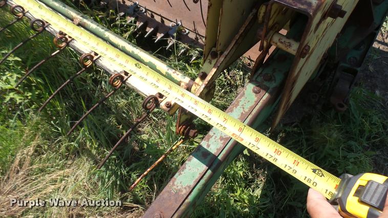 image for item DA7951 John Deere 215A self-propelled windrower