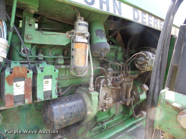 image for item K6472 1983 John Deere 4450 MFWD tractor