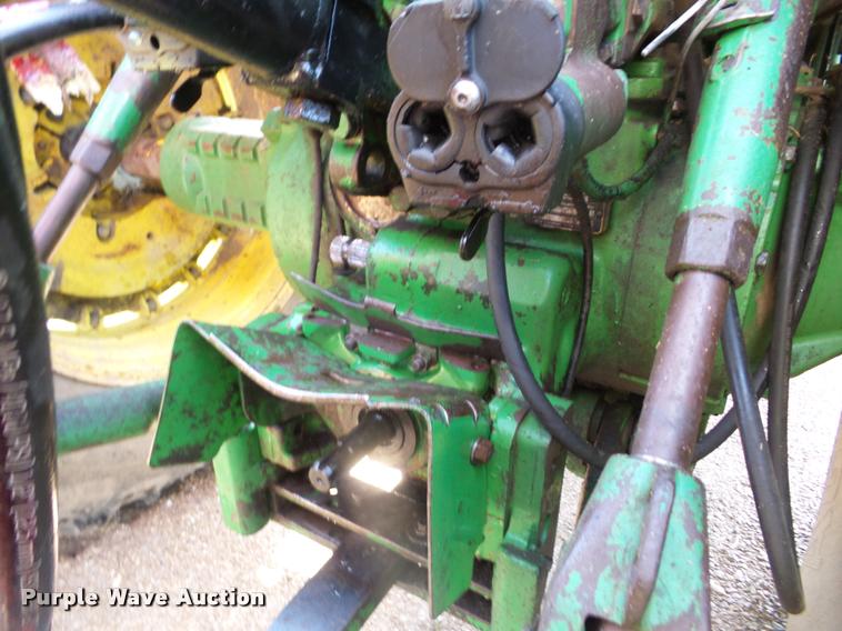 image for item K6472 1983 John Deere 4450 MFWD tractor
