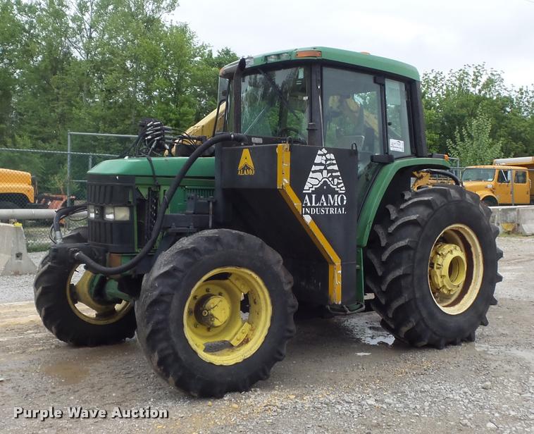 image for item K7637 1999 John Deere 6410 MFWD tractor