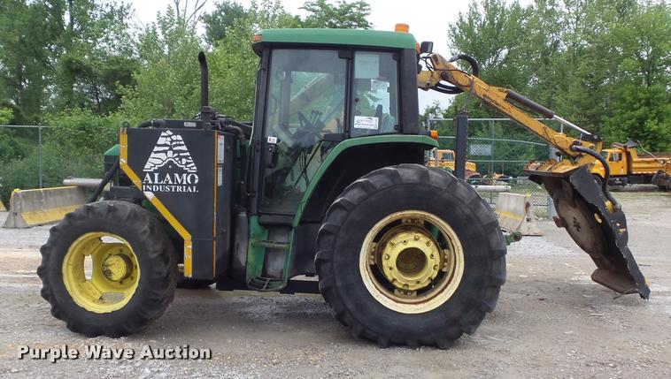 image for item K7637 1999 John Deere 6410 MFWD tractor