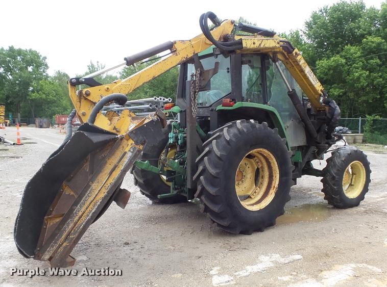 image for item K7637 1999 John Deere 6410 MFWD tractor