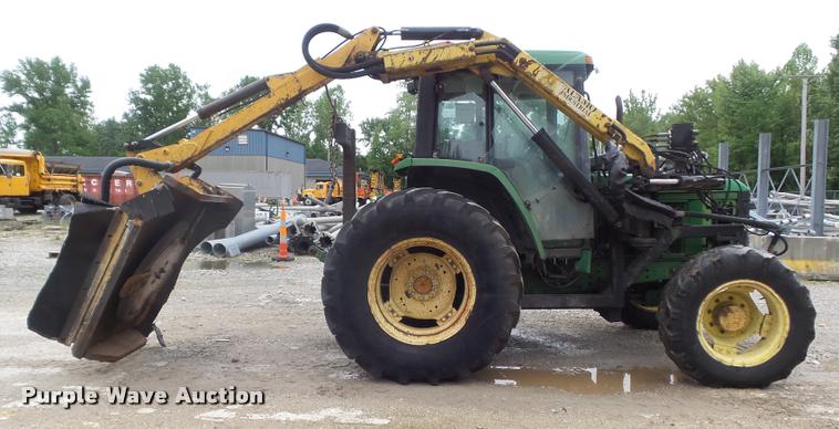 image for item K7637 1999 John Deere 6410 MFWD tractor