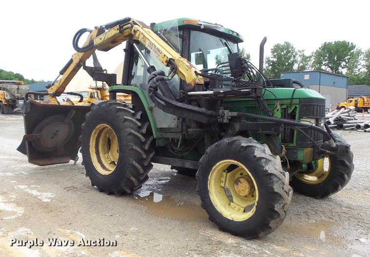 image for item K7637 1999 John Deere 6410 MFWD tractor