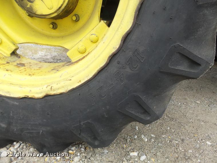 image for item K7637 1999 John Deere 6410 MFWD tractor