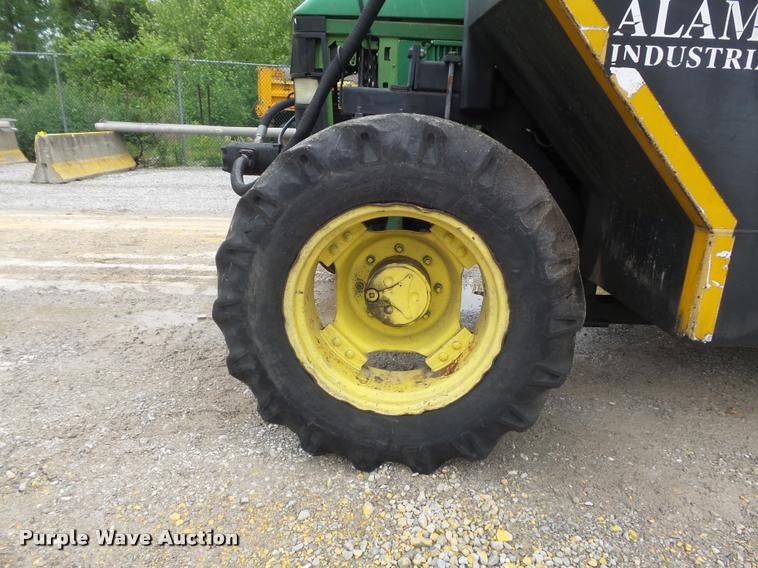 image for item K7637 1999 John Deere 6410 MFWD tractor