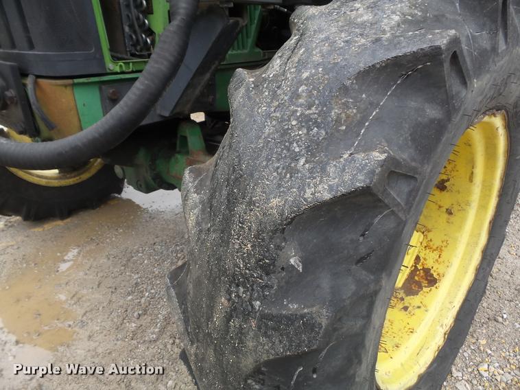 image for item K7637 1999 John Deere 6410 MFWD tractor