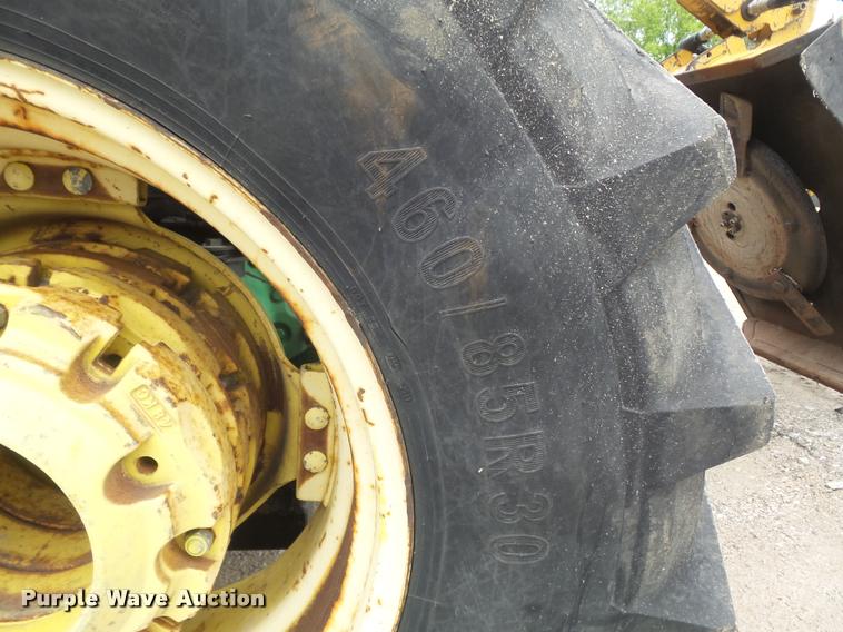 image for item K7637 1999 John Deere 6410 MFWD tractor