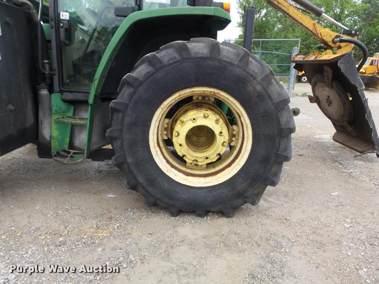 image for item K7637 1999 John Deere 6410 MFWD tractor