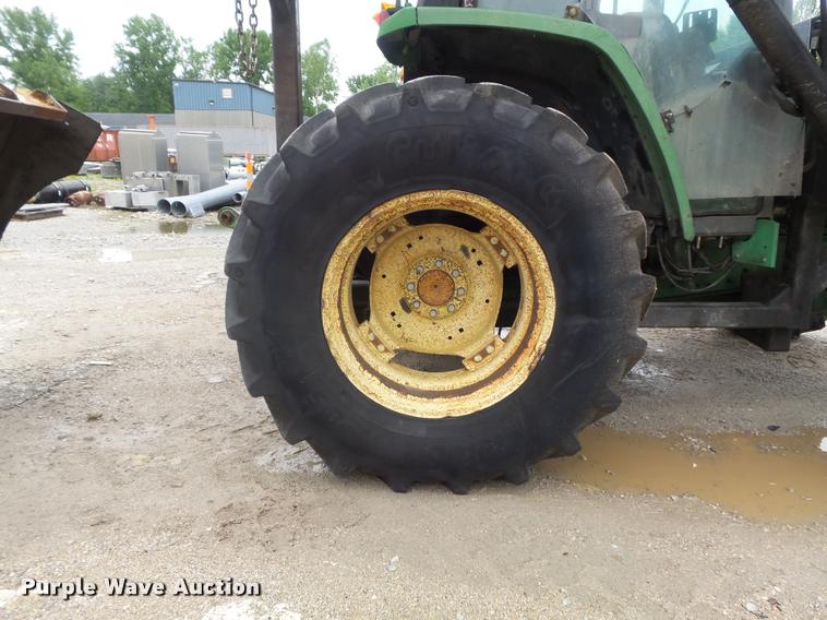 image for item K7637 1999 John Deere 6410 MFWD tractor