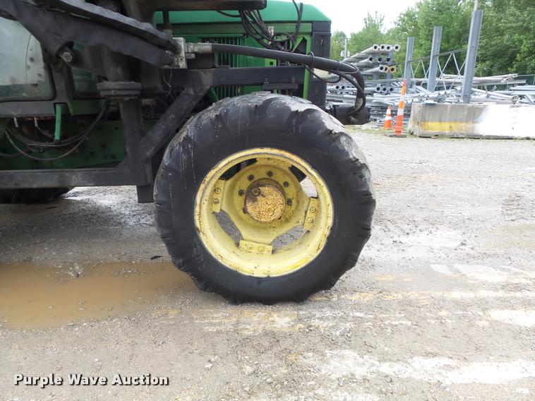 image for item K7637 1999 John Deere 6410 MFWD tractor