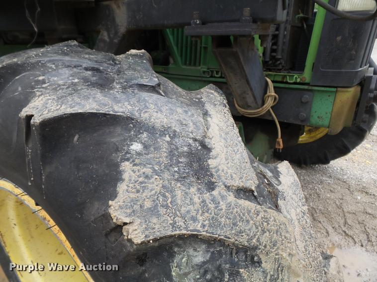 image for item K7637 1999 John Deere 6410 MFWD tractor