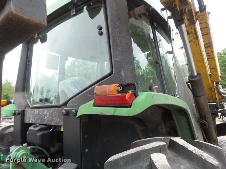 image for item K7637 1999 John Deere 6410 MFWD tractor