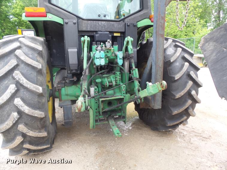 image for item K7637 1999 John Deere 6410 MFWD tractor