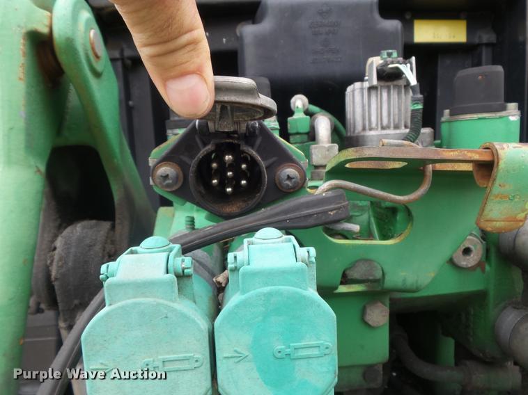 image for item K7637 1999 John Deere 6410 MFWD tractor