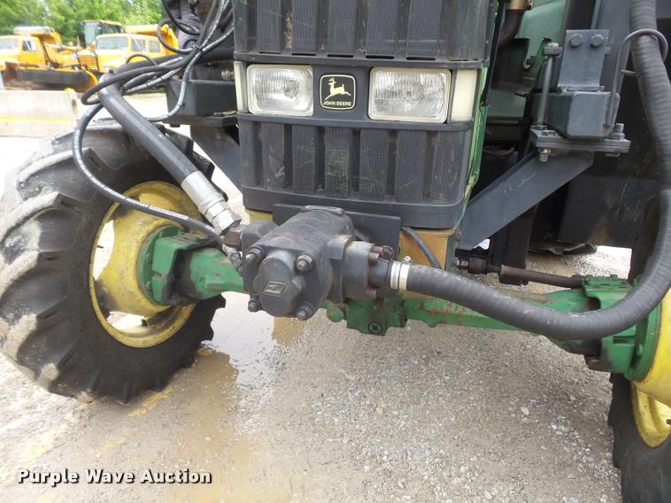 image for item K7637 1999 John Deere 6410 MFWD tractor