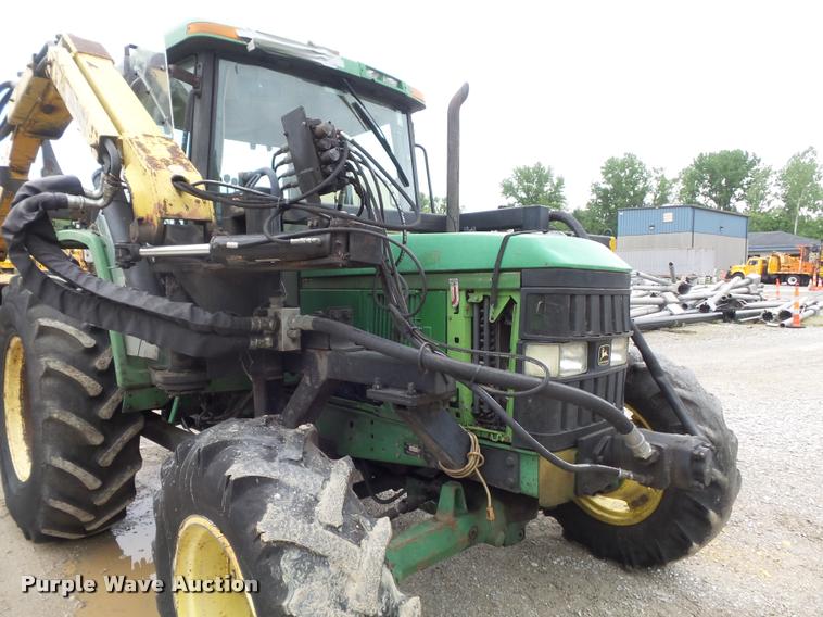 image for item K7637 1999 John Deere 6410 MFWD tractor