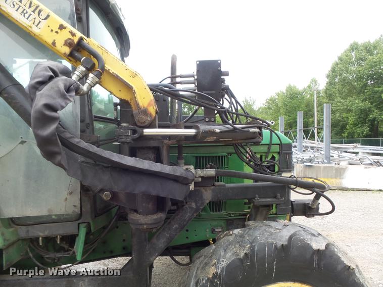 image for item K7637 1999 John Deere 6410 MFWD tractor