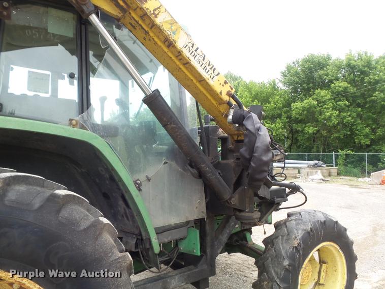 image for item K7637 1999 John Deere 6410 MFWD tractor