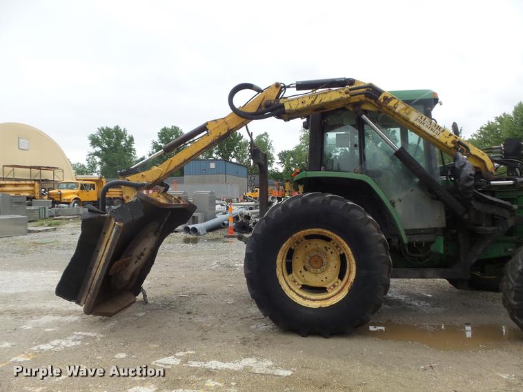 image for item K7637 1999 John Deere 6410 MFWD tractor