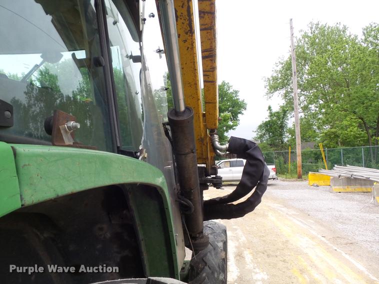 image for item K7637 1999 John Deere 6410 MFWD tractor