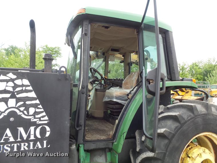 image for item K7637 1999 John Deere 6410 MFWD tractor