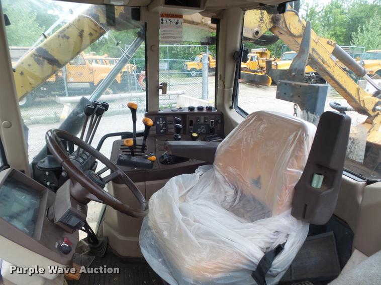 image for item K7637 1999 John Deere 6410 MFWD tractor