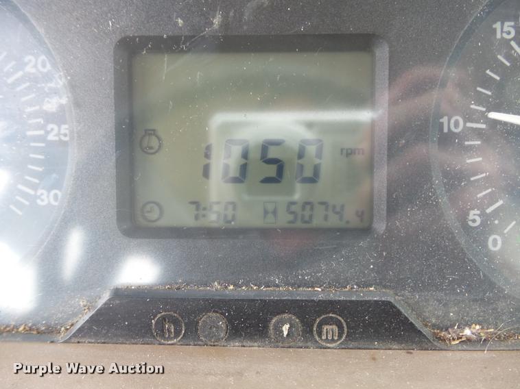 image for item K7637 1999 John Deere 6410 MFWD tractor