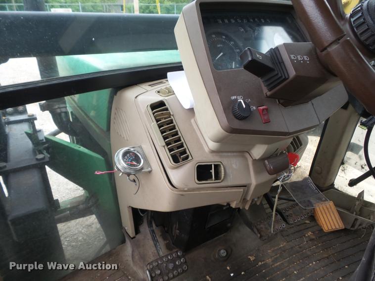 image for item K7637 1999 John Deere 6410 MFWD tractor