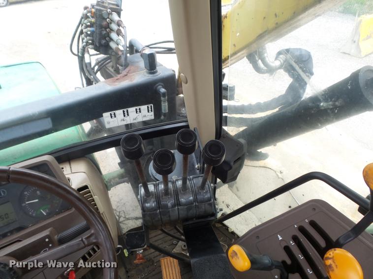 image for item K7637 1999 John Deere 6410 MFWD tractor